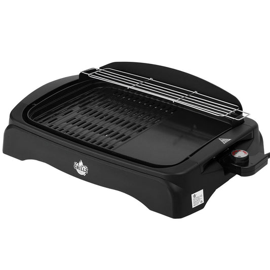 Black electric grill on a white background