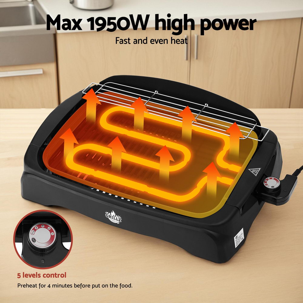 Electric grill with heating elements and power rating on a kitchen counter