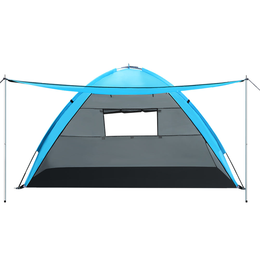Blue and black tent with a white background