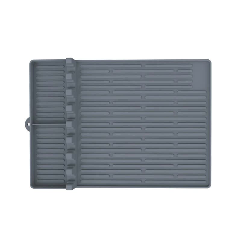 Gray silicone grill mat with ribbed surface on a white background