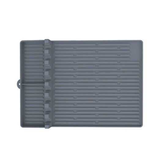Gray silicone grill mat with ribbed surface on a white background