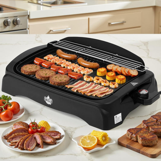 Portable grill with food on a kitchen counter, featuring a brand logo.